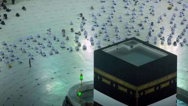 A different hajj in Mecca: Disinfectant-spraying robots, social distancing and smart bracelets with pilgrims’ vaccine data