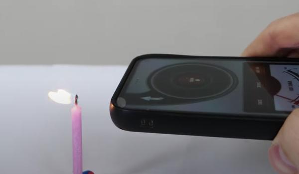 An iPhone app that extinguishes candles How does air come out?