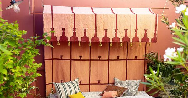 DIY déco d’extérieur : coudre un rideau en lin pour protéger sa terrasse 