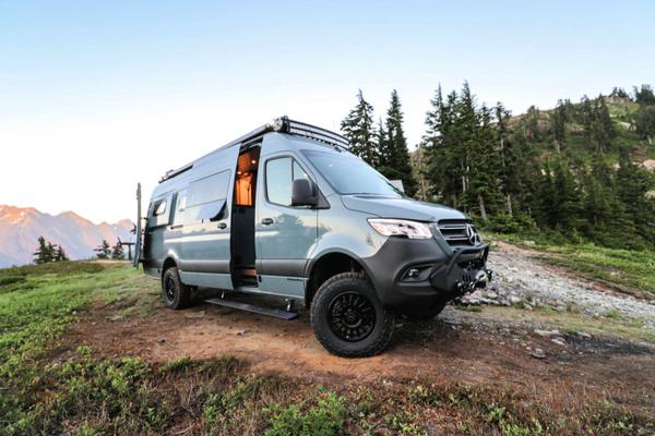 This custom camper van can sleep a family of 6 