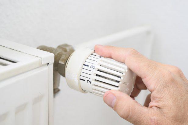 In case of absence, should you turn off its radiators in the middle of the day to save energy?