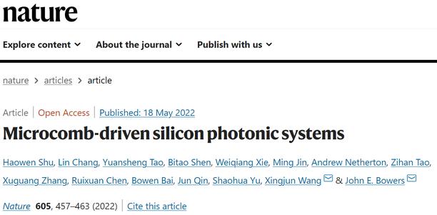 Microcomb-driven silicon photonic systems