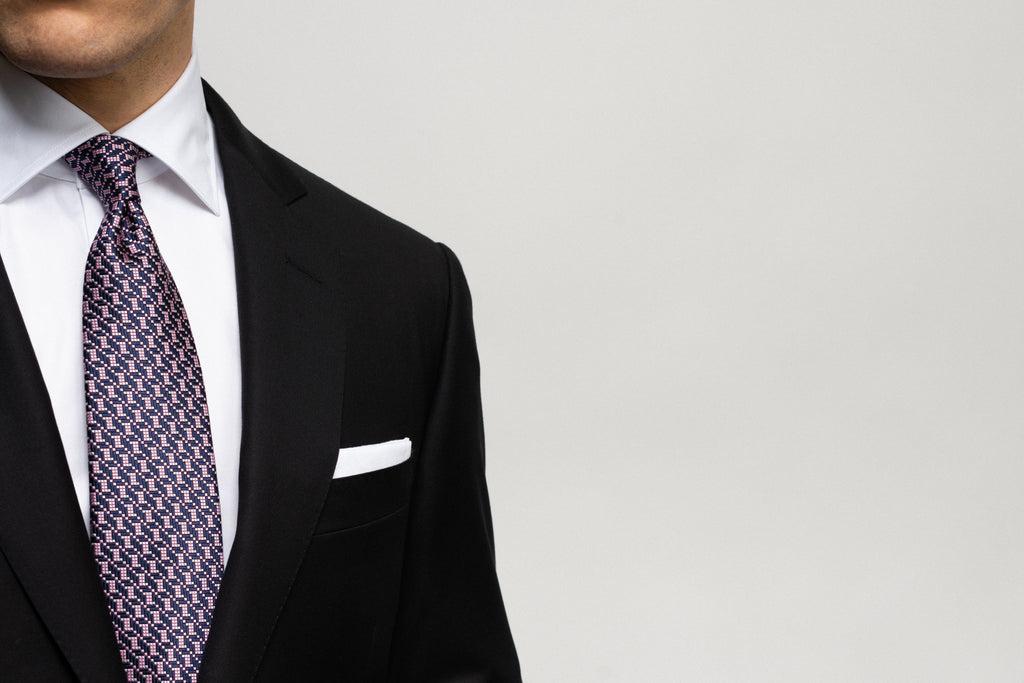 How to Match a Tie With a Black Dress More Articles
