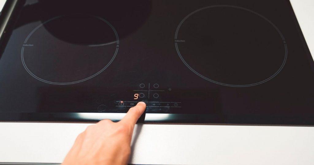 How do I unlock my GE induction cooktop?